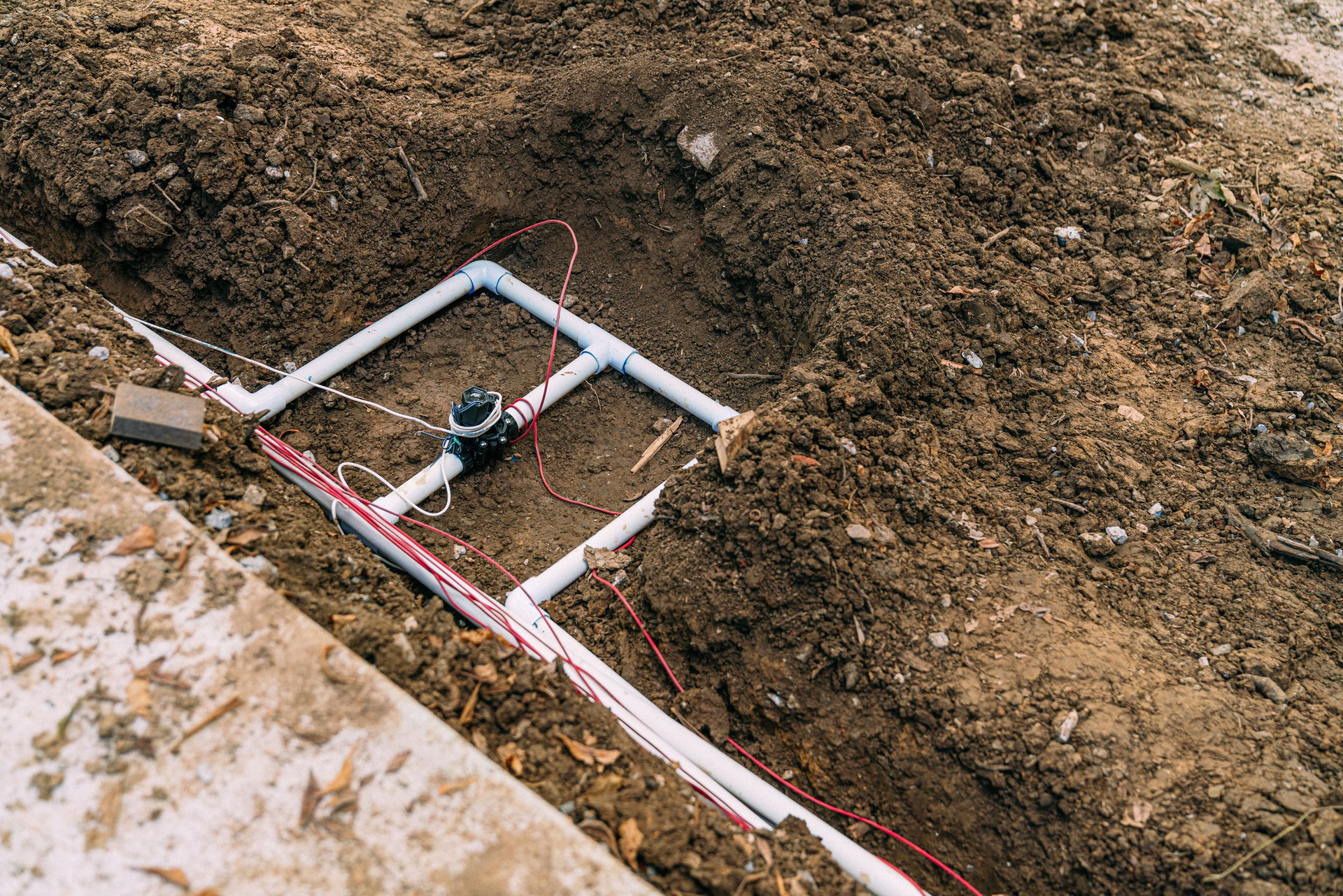 Irrigation Pipe in Dirt Trenches for Underground Sprinkler Irrigation System